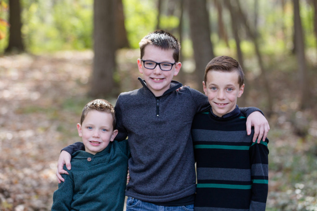 three boys family picture fall leaves green bay wisconsin