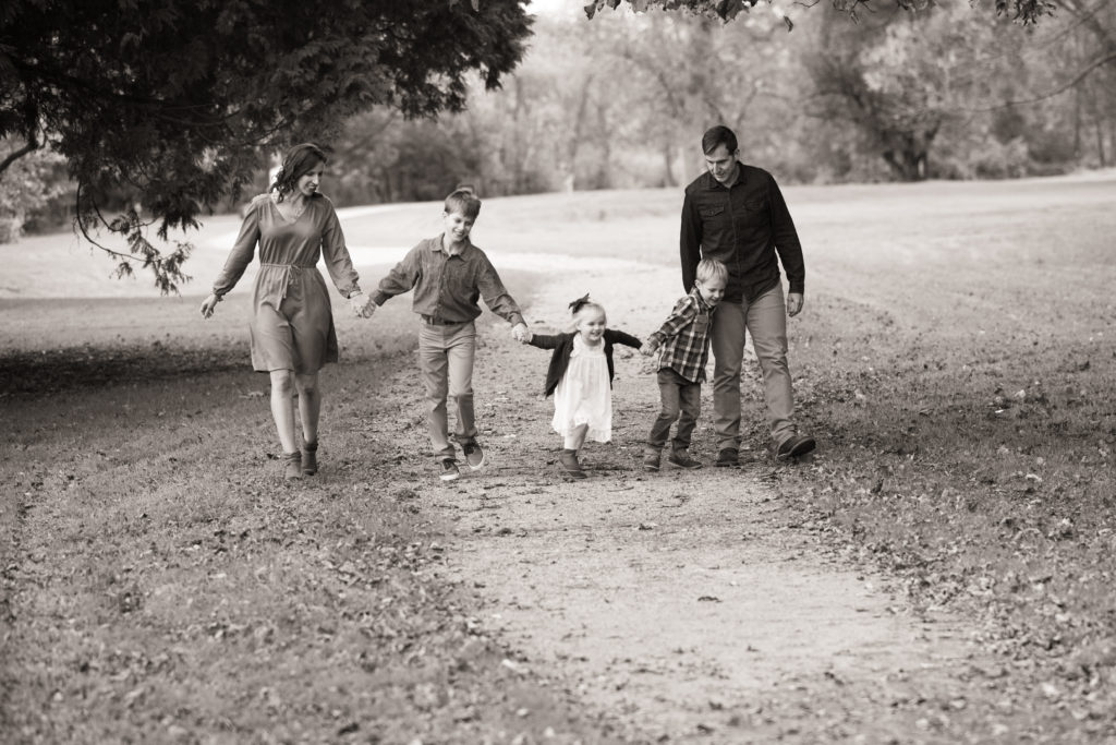 family walking black and white 