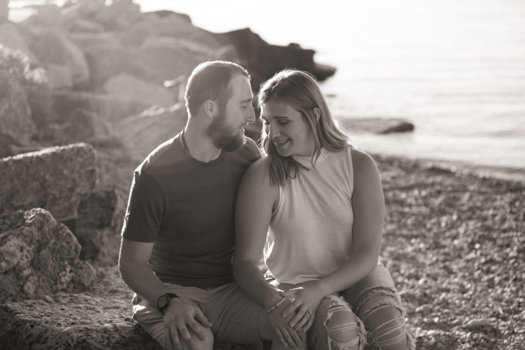 black and white engagement photo rocks green bay wisconsin 