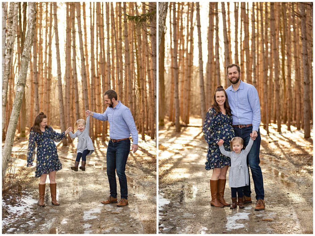 maternity photos mom dad and toddler. toddler swinging between mom and dad 