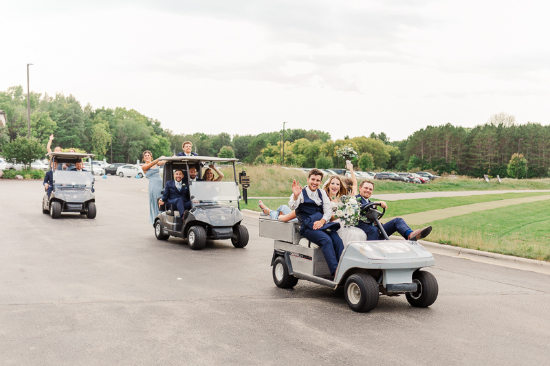 wedding party in golf carts at thornberry creek at oneida 