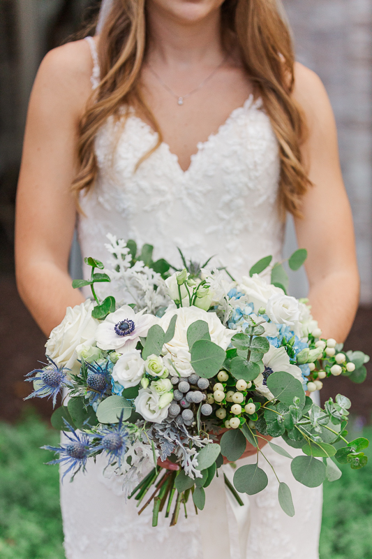 white and blue bridal bouquet at thornberry creek at oneida 