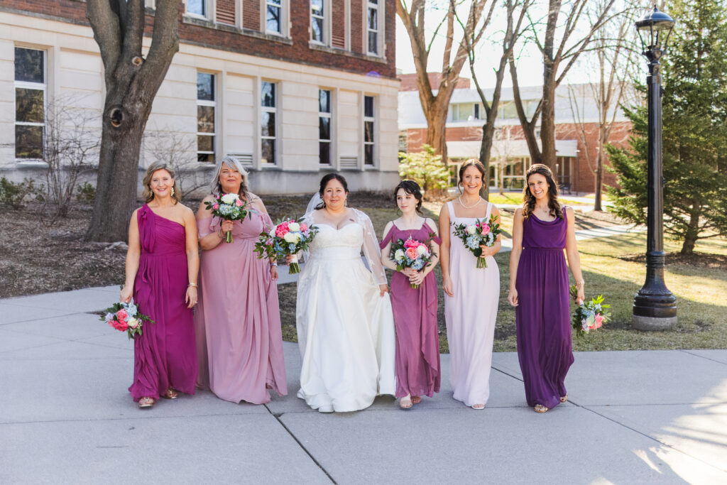 Bridesmaid photo on campus of St. Norbert College 